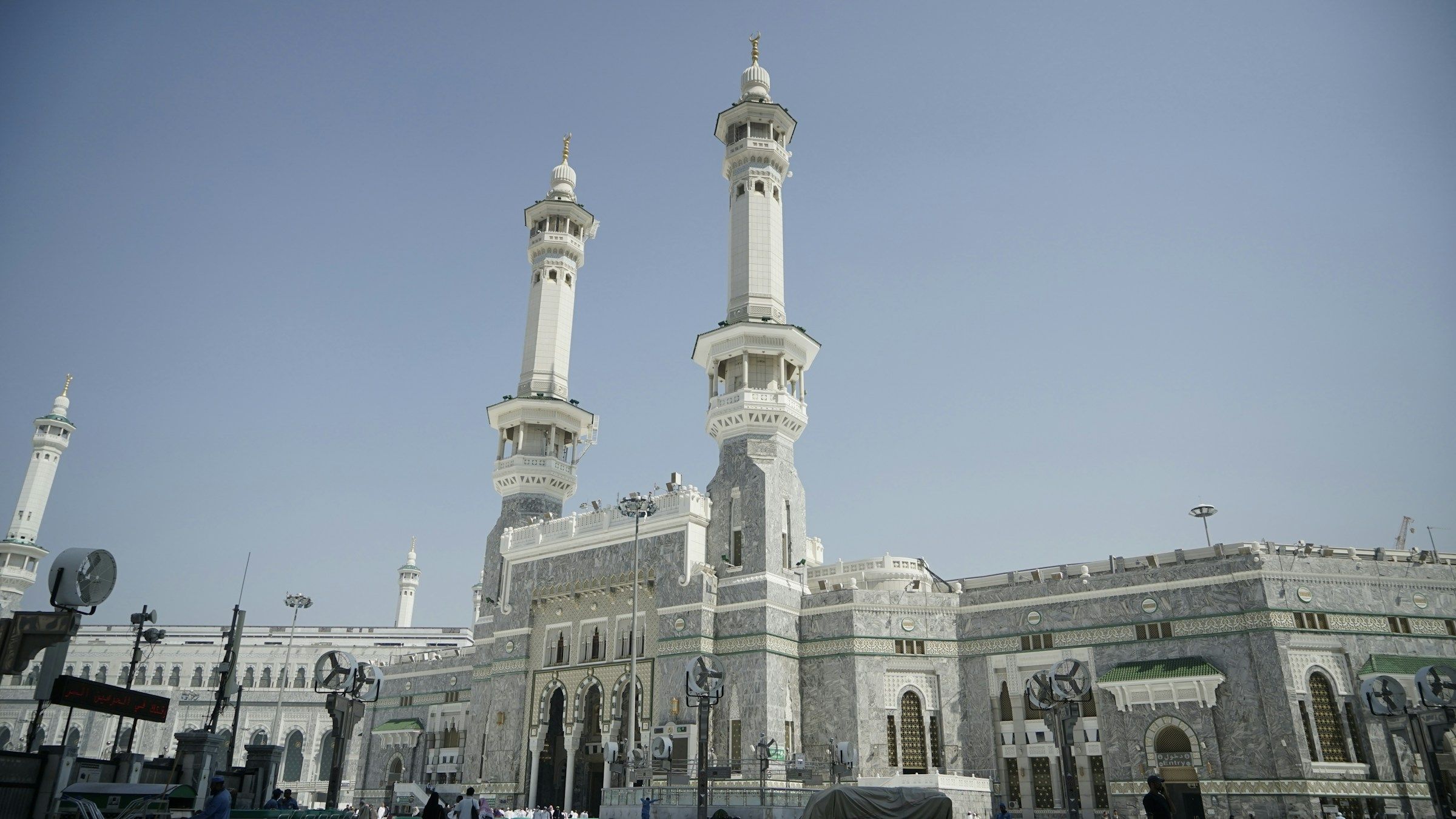 The marble gate and minarets at an entrance to Masjid al-Haram